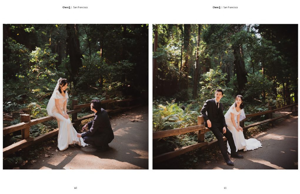 Couple walking through redwood forest