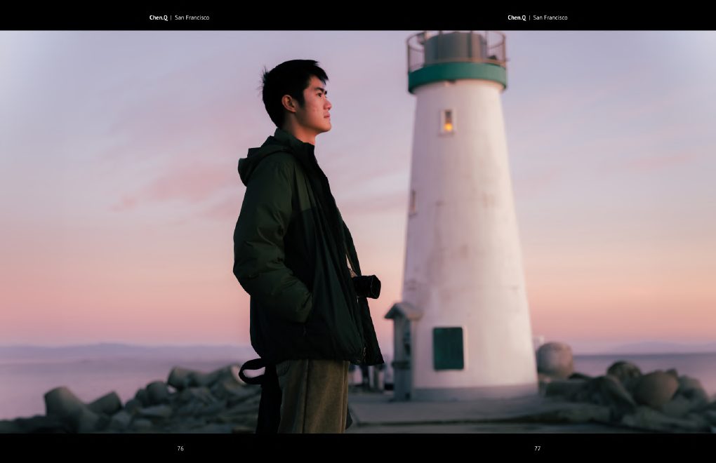 Portrait beside a lighthouse at dusk